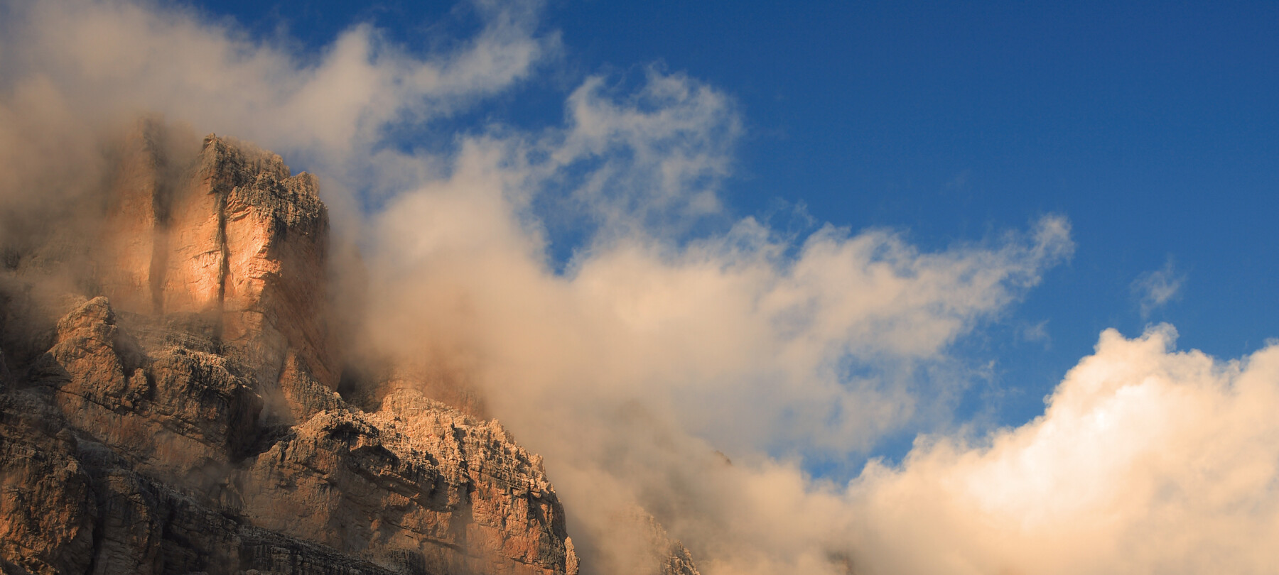 Dolomiti di Brenta - Cima Tosa avvolta nelle nuvole | © Pio Geminiani