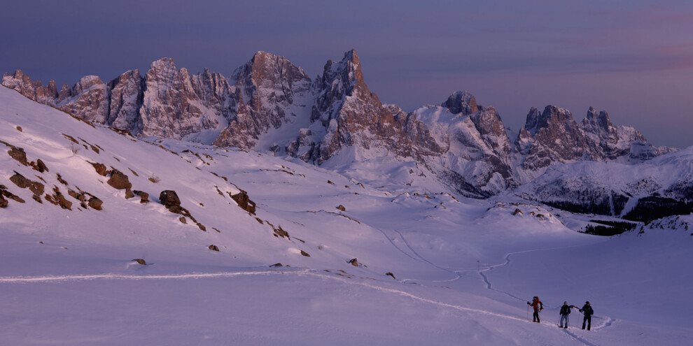 Sunset snowshoeing at Passo Rolle