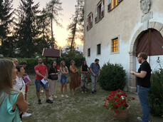 An evening visit to Castel Coredo and Palazzo Nero among clues to be solved and characters to be found
