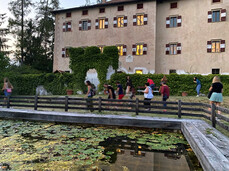 An evening visit to Castel Coredo and Palazzo Nero among clues to be solved and characters to be found