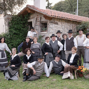 image of a group of men and women wearing traditional clothes from the past