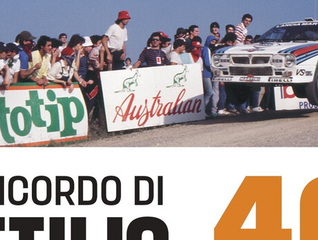 Historic rally car jumping during a race