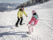 Trento - Monte Bondone - Maestro di snowboard con bambina
