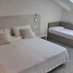  Foto von Dreibettzimmer