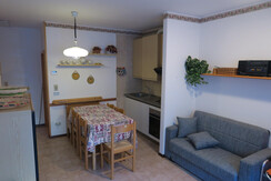 Soggiorno con angolo cottura