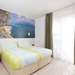  Foto von Dreibettzimmer