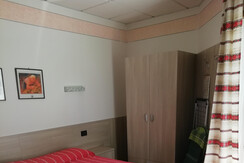 camera 11 piano terra con terrazzino