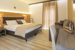 Hotel Alla Rocca Fiemme Trentino camera quadrupla