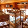  Foto von Hütte - Bett im Schlafsaal