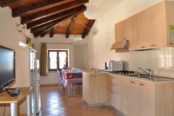 Zona pranzo con agolo cottura