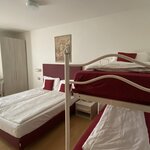  Photo of Camera Quadrupla con Balcone