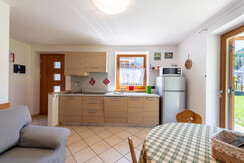 soggiorno con angolo cottura