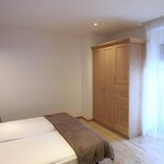  Foto von Doppelzimmer, Dusche, WC, Bergseite