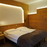  Foto von Familienzimmer, Dusche, WC, Bergseite