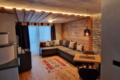 soggiorno con stufa ad ole