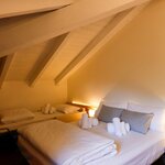  Foto von Dreibettzimmer