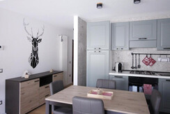 Sala da pranzo con cucina