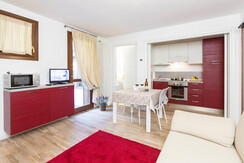 1. Monolocale con porticato_Soggiorno e cucina