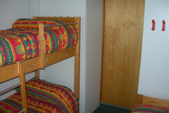 bedroom with bunk bed + 1 single bed