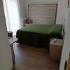  foto van Room with 4 beds