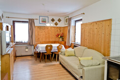 Soggiorno con angolo cottura