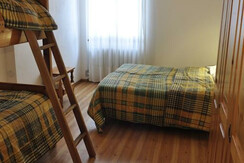 Camera da letto -quadrilocale - Casa del Roccolo