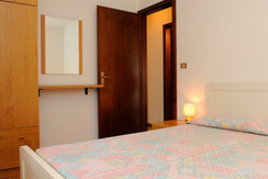 camera_da_letto_luminosa_e_confortevole_quadriloca