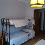  Photo of 4-bed room, with bunk bed
