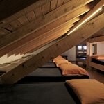  Foto von Hütte - Betten im Schlafsaal