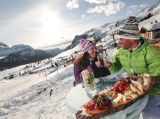 Skifahren in Val di Fassa: kulinarische Berghütte